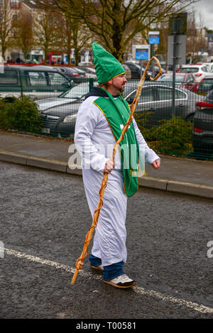 Athlone Town, Ireland. 16th March 2019. A man dressed as St. Patrick walks the 2019 Athlone Town St. Patricks Day Parade route at Golden Island. Credit: Eoin Healy/Alamy Live News Stock Photo