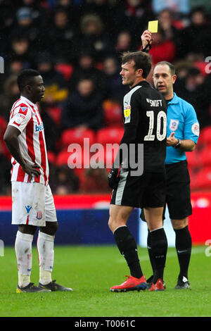 Stoke-on-Trent, England, UK. 16th March 2019.Reading midfielder John Swift (10) receives a yellow card  during the EFL Sky Bet Championship match between Stoke City and Reading at the BET365 Stadium, Stoke-on-Trent, England on 16 March 2019. Photo by Jurek Biegus.  Editorial use only, license required for commercial use. No use in betting, games or a single club/league/player publications. Credit: UK Sports Pics Ltd/Alamy Live News Stock Photo