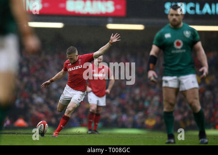 Cardiff, UK. 16th March 2019. Gareth Anscombe of Wales kicks a penalty. .Wales v Ireland , Guinness Six Nations 2019 international rugby match at the Principality Stadium in Cardiff ,Wales , UK on Saturday 16th March 2019.   pic by Andrew Orchard/Alamy Live News  PLEASE NOTE PICTURE AVAILABLE FOR EDITORIAL USE ONLY Stock Photo