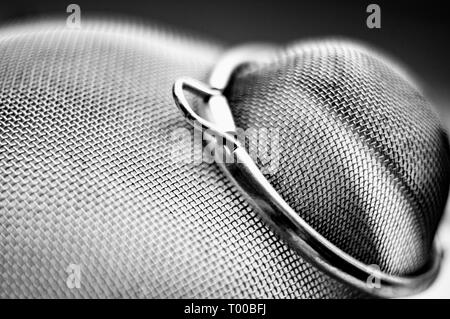 Detail of two metallic strainers forming and interesting geometric texture. It can be used as background Stock Photo