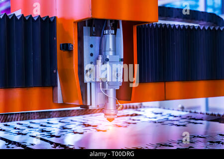 laser cutting machine controller by CNC program Stock Photo