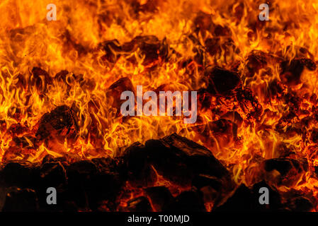 Close up view of boiling flames in a steamship coal fed fire. Stock Photo