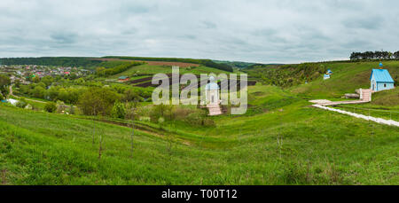 Rukomysh Cave temple and spring country fields and village, Buchach District, Ternopil Region, Ukraine. Stock Photo