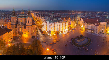 Prague - The panorama with the St. Nicholas church, Staromestske square and the Old Town at dusk.