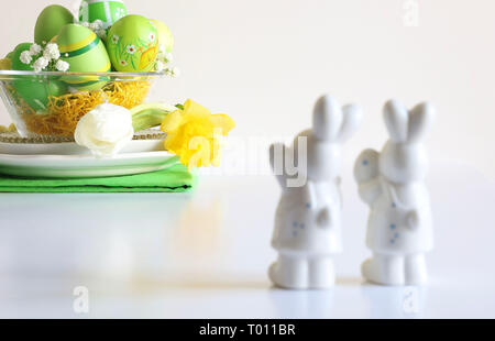 Two bunnies and easter decoration isolated on white background Stock Photo