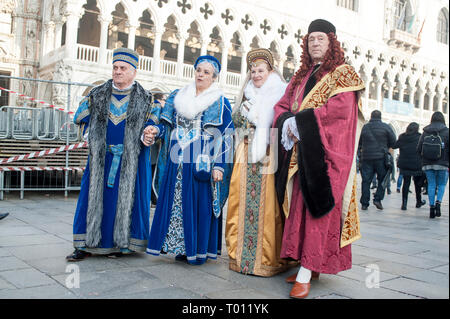 Venice, Italy - February 20 2019 - Group of Venice Carnival Mask Stock Photo