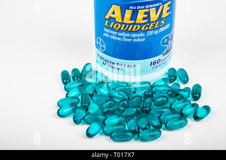 ATLANTA, GEORGIA - March 13, 2017: A bottle ofAleve Gel Caps with bottle on white background Stock Photo