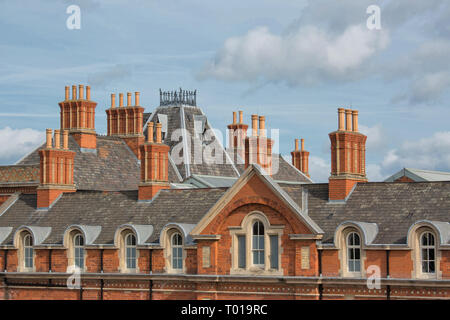 Chimneys and Chimney Pots - Tall Brick Chimney Stacks on Victorian Railway Station in Nottingham Stock Photo