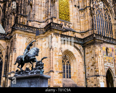 Equestrian statue of Saint George with St. Vitus cathedral in background, Prague castle, Czech Republic Stock Photo