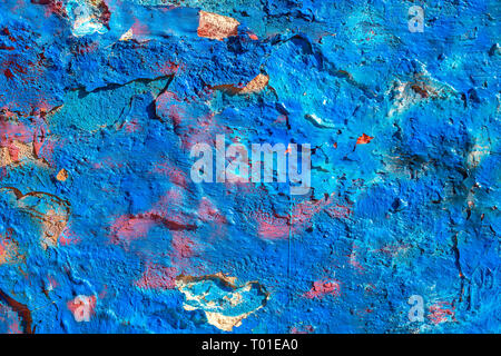 Blue painted stucco wall on Burano Island in the Venetian Lagoon near Venice, Italy. Background texture. Stock Photo