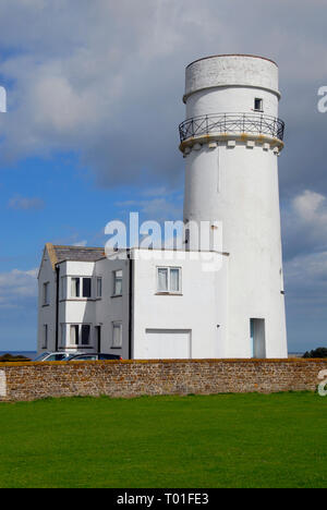 Disused lighthouse and outbuildings, Hunstanton, Norfolk, England, now used as holiday homes Stock Photo