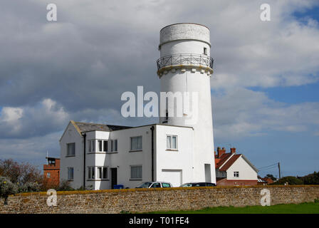 Disused lighthouse and outbuildings, Hunstanton, Norfolk, England, now used as holiday homes Stock Photo