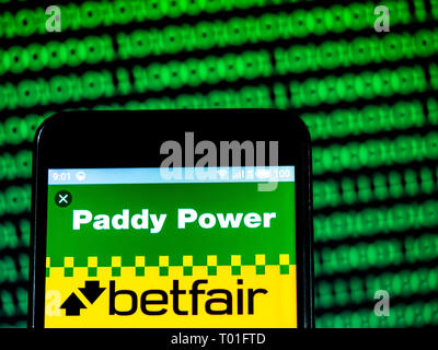 Paddy Power logo seen displayed on smart phone. Stock Photo