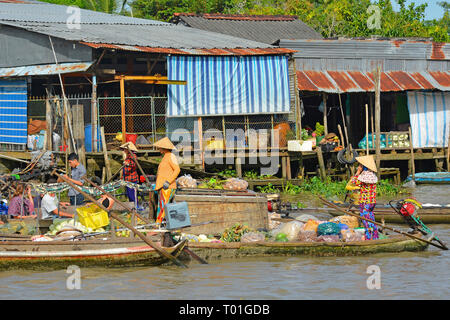 Phong Dien, Vietnam - December 31st 2017. Boat on the river at the Phong Dien Floating Market near Can Tho in the Mekong Delta Stock Photo