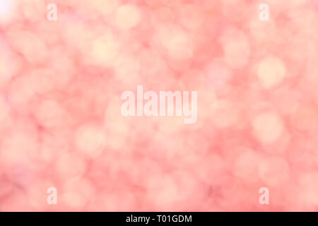 Pink bokeh defocused blurred lights and sparkles abstract background Stock Photo