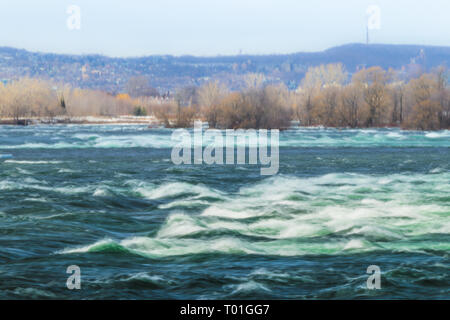Rapids on Saint Lawrence River in early Spring Stock Photo