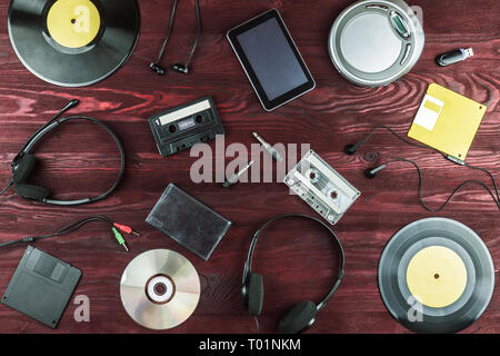 objects for audio recordings on a red background Stock Photo