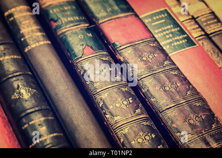 Close up of antique leather books, vintage style background Stock Photo