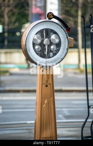 Outdoor vintage pay scales on the street in Vienna, Austria. Stock Photo