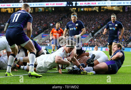 England's Tom Curry scores their side's second try of the game during