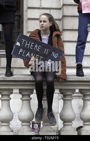 London, Greater London, UK. 15th Mar, 2019. A student seen holding a placard reading 'There is no planet b'' during the protest.Hundreds of young people gathered at Parliament Square, joining the Global Climate Strike and demanding from the government and politicians direct actions to tackle the climate change. Students in more than 100 countries went to the streets to participate in a climate global strike. Credit: Andres Pantoja/SOPA Images/ZUMA Wire/Alamy Live News Stock Photo