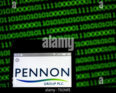 The Pennon Group logo is seen on an LED screen in the background while ...