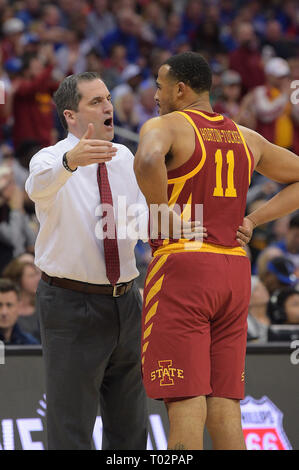 Kansas City, Missouri, USA. 16th Mar, 2019. Iowa State Cyclones head coach Steve Prohm has a few words with Iowa State Cyclones guard Talen Horton-Tucker (11) during a dead ball during the Phillips 66 Big 12 Men's Basketball Championship Game between the Kansas Jayhawks and the Iowa State Cyclones at the Sprint Center in Kansas City, Missouri. Kendall Shaw/CSM/Alamy Live News Stock Photo