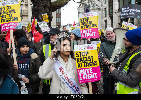 London, UK. 16th March, 2019. Miss Lancashire Aysha Khan prepares to join thousands of people on the March Against Racism demonstration on UN Anti-Racism Day against a background of increasing far-right activism around the world and a terror attack yesterday on two mosques in New Zealand by a far-right extremist which left 49 people dead and another 48 injured. Credit: Mark Kerrison/Alamy Live News Stock Photo