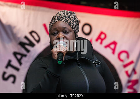 London, UK. 16th March, 2019. Janet Alder, sister of Christopher Alder, who died aged 37 handcuffed and face down surrounded by police officers in a Hull police station in April 1998 after choking on his own vomit, addresses thousands of people on the March Against Racism demonstration on UN Anti-Racism Day against a background of increasing far-right activism around the world and a terror attack yesterday on two mosques in New Zealand by a far-right extremist which left 49 people dead and another 48 injured. Credit: Mark Kerrison/Alamy Live News Stock Photo