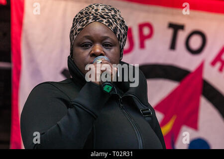London, UK. 16th March, 2019. Janet Alder, sister of Christopher Alder, who died aged 37 handcuffed and face down surrounded by police officers in a Hull police station in April 1998 after choking on his own vomit, addresses thousands of people on the March Against Racism demonstration on UN Anti-Racism Day against a background of increasing far-right activism around the world and a terror attack yesterday on two mosques in New Zealand by a far-right extremist which left 49 people dead and another 48 injured. Credit: Mark Kerrison/Alamy Live News Stock Photo