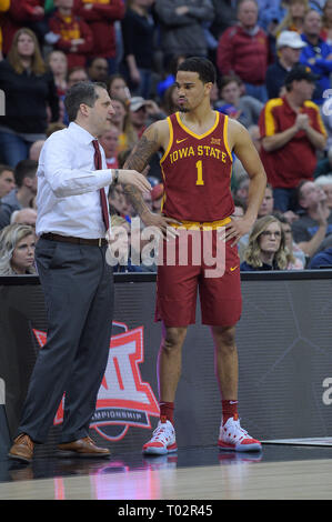 Kansas City, Missouri, USA. 16th Mar, 2019. Iowa State Cyclones head coach Steve Prohm talks with Iowa State Cyclones guard Nick Weiler-Babb (1) during a dead ball during the Phillips 66 Big 12 Men's Basketball Championship Game between the Kansas Jayhawks and the Iowa State Cyclones at the Sprint Center in Kansas City, Missouri. Kendall Shaw/CSM/Alamy Live News Stock Photo