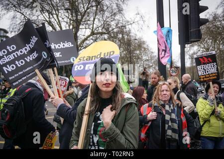 London, UK. 16th March 2019. Protesters are seen holding placards during an anti racist demonstration. Thousands of anti-racists groups took to the streets marking the World against Racism global day of action. Credit: SOPA Images Limited/Alamy Live News Stock Photo
