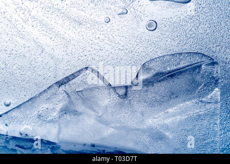 Abstract background of slabs of ice with many air bubbles. Stock Photo