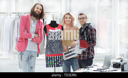 creative group of designers standing in a modern Studio.photo with copy space Stock Photo