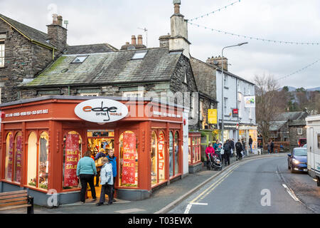 Shops and stores in the lake District village of Ambleside including Edge of the World clothing shop,Lake District,Cumbria,England Stock Photo