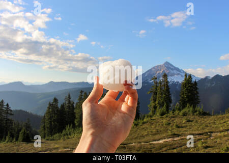 Snow ball on top of the mountains Stock Photo