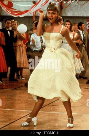 olivia newton john grease yellow dress 1978 Stock Photo spiked slip on shoes
