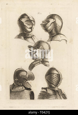 Helmet of John de Courcy, Earl of Ulster, 13thC 1,2, helmet of John of Gaunt, Duke of Lancaster 14thC 3,  helmet similar to Oliver Cromwell’s 4, helmet for King Henry VIII 5. All in the Tower of London. Copperplate engraving from Francis Grose's Military Antiquities respecting a History of the English Army, Stockdale, London, 1812. Stock Photo