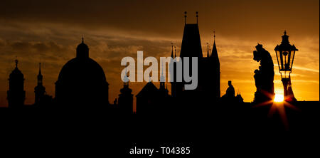 Praghe - The Charles bridge silhouette at the sunrise. Stock Photo