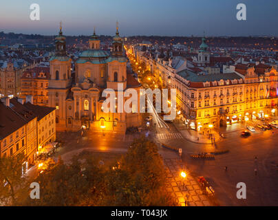 Prague - The panorama with the St. Nicholas church, Staromestske square and the Old Town at dusk.
