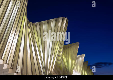 REGGIO EMILIA, ITALY - APRIL 13, 2018:  The Reggio Emilia AV Mediopadana railway station at dusk by architect Santiago Calatrava. Stock Photo