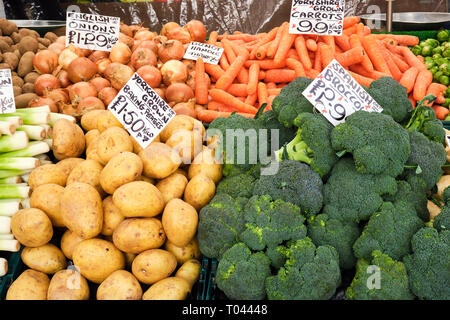 Broccoli, potatoes and other vegetables for sale at a market Stock Photo