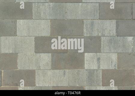 Gray paving slab laid out with geometric pattern, abstract texture, background Stock Photo
