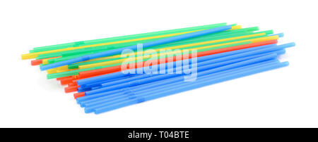 A pile of multicolored tubes for cocktails isolated on white background Stock Photo
