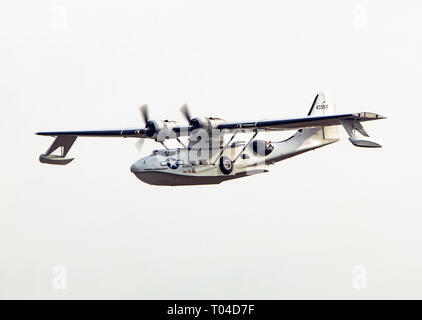 A USAF Catalina spotter plane flying over Duxford Stock Photo