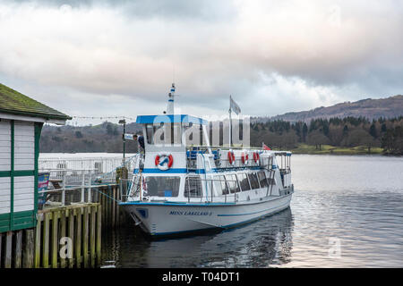 Skipper aboard Miss Lakeside sightseeing boat at Ambleside Pier on lake windermere, early morning,Cumbria,England Stock Photo