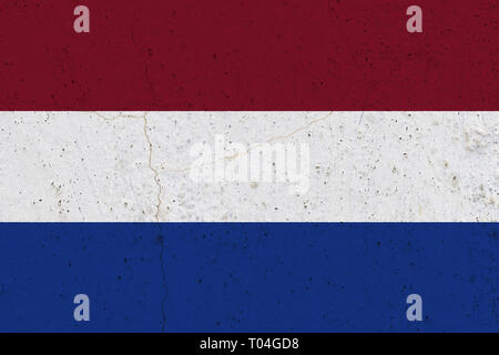 Netherlands flag on concrete wall. Patriotic grunge background. National flag of Netherlands Stock Photo