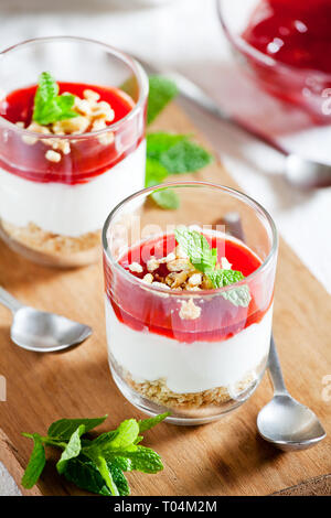 Couple of glasses of homemade strawberry cheesecake Stock Photo
