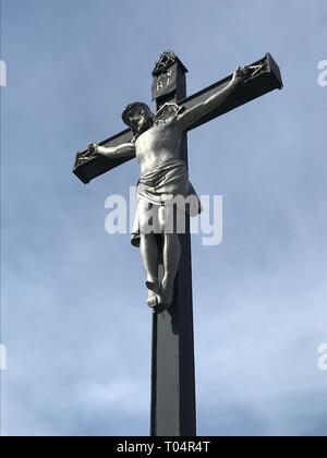 closeup of jesus crucified on the cross. Image shows the cross from below  Stock Photo - Alamy