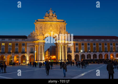 Triumphal Arch of Rua Augusta at dusk, Commerce Square. Lisbon, Portugal. Europe Stock Photo